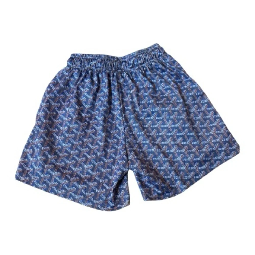 ⭐️ Mr. Remade Blue and Brown Patterned Shorts ⭐️ - Picture 2 of 3